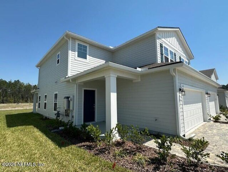 Front exterior of a new home in , St. Augustine, FL, highlighting curb appeal (Image 1). Front exterior of a new home in , St. Augustine, FL, highlighting curb appeal (Image 1).