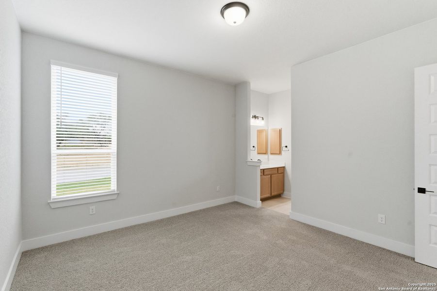 Spacious, unfurnished interior of a new home in Potranco Oaks, Castroville (Image 48).