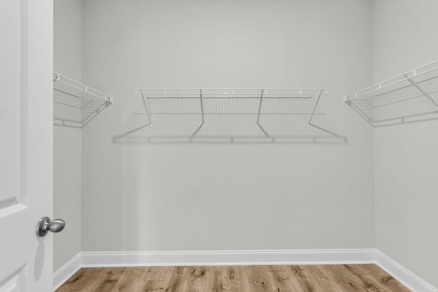 Spacious, unfurnished interior of a new home in Tidewater at Lakes of Cane Bay, Summerville (Image 18).