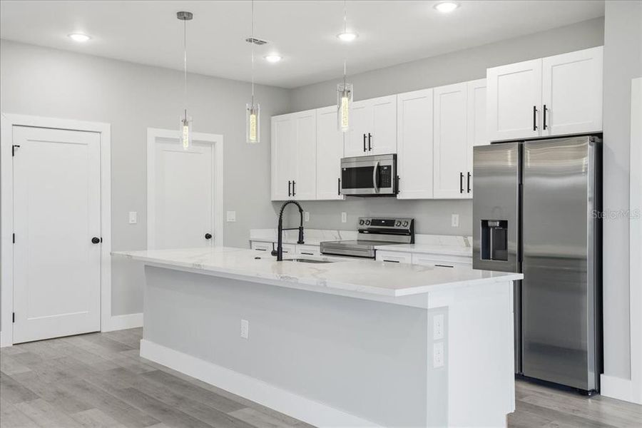 Furnished interior view inside a new home in , Port Charlotte (Image 12).