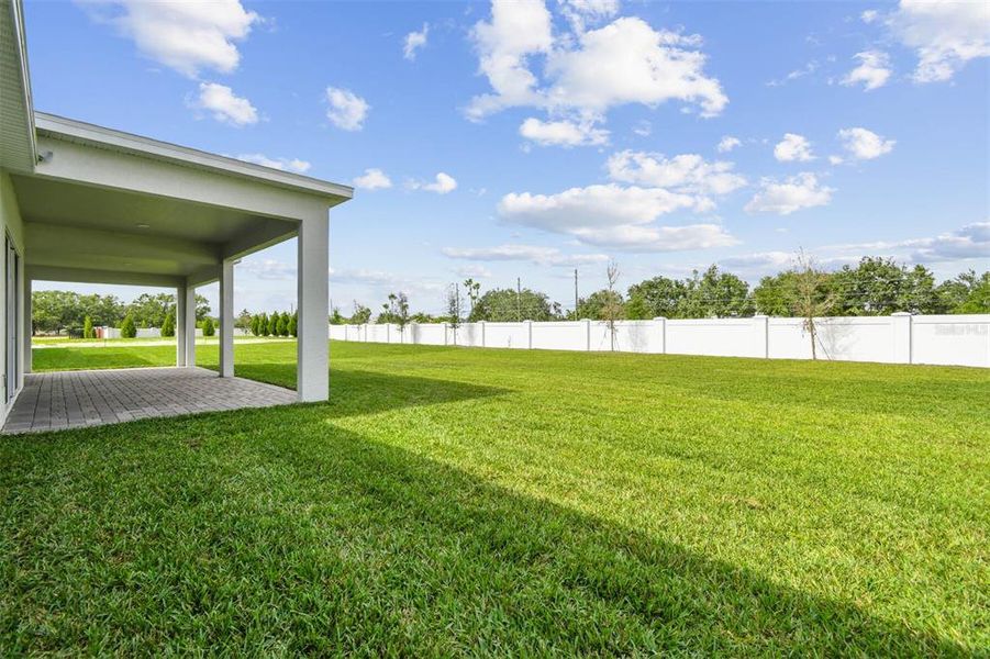 Exterior details and patio area of a home in Solace at Corner Lake, Orlando (Image 4).