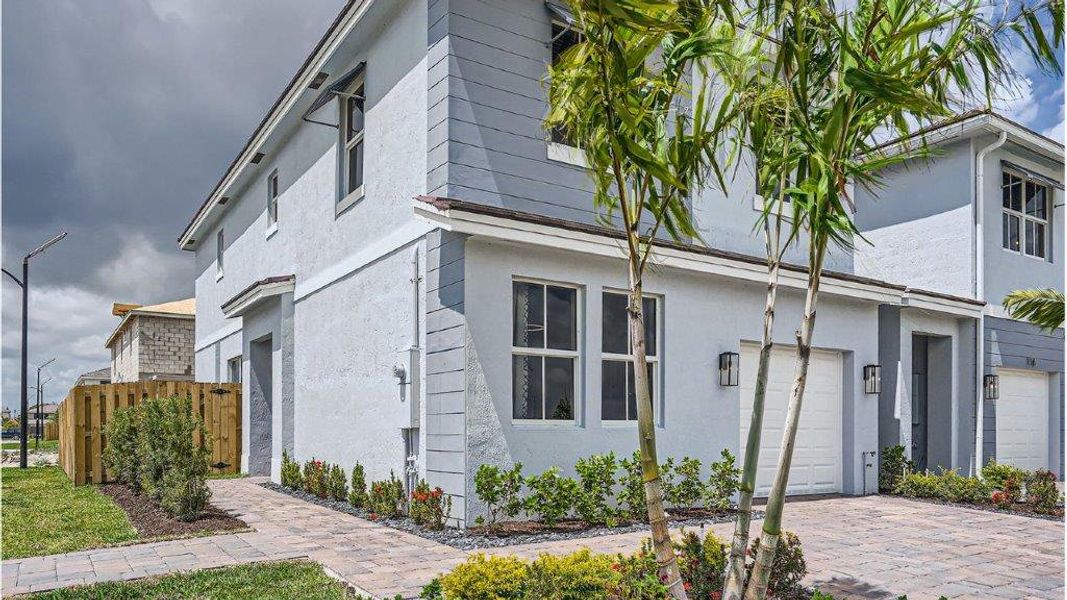 Representative exterior photo of a completed home built from the Denali by D.R. Horton in Parker Pointe, Homestead, FL (Image 21). Representative exterior photo of a completed home built from the Denali by D.R. Horton in Parker Pointe, Homestead, FL (Image 21).