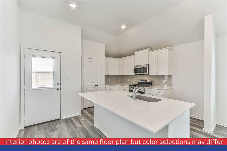 The kitchen is a chef's dream, featuring beautiful granite countertops, ample cabinet space, and modern stainless steel appliances. Whether you're preparing a quick weekday meal or hosting a dinner party, this kitchen has everything you need.