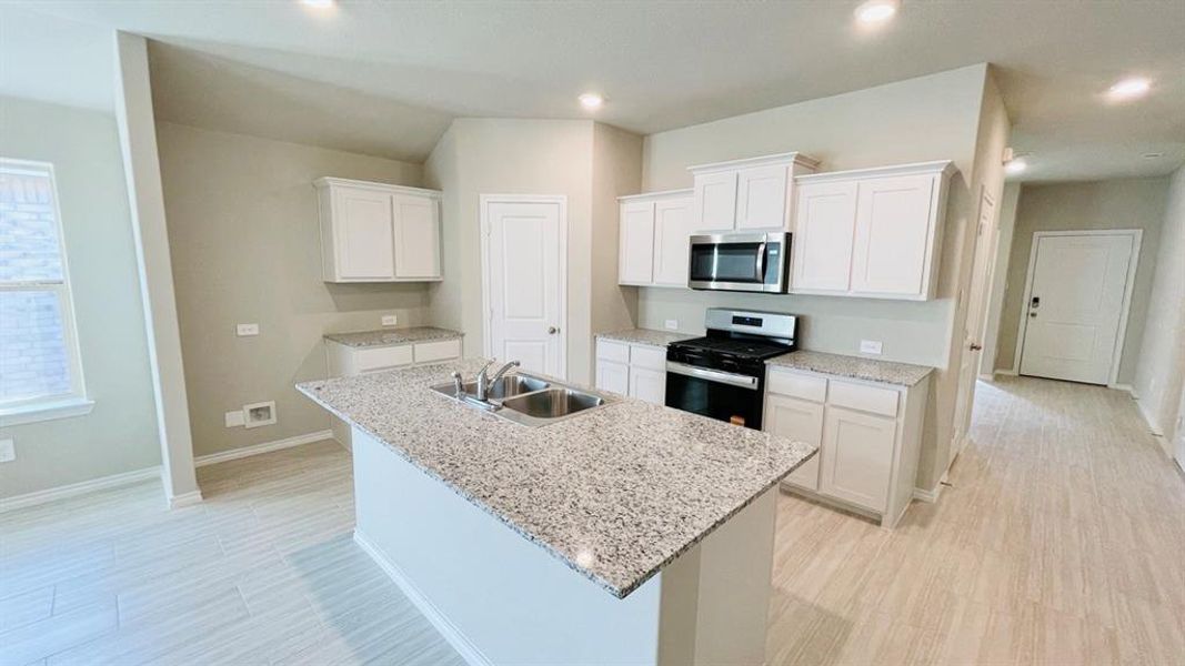 Kitchen - All Home and community information, including pricing, included features, terms, availability and amenities, are subject to change at any time without notice or obligation. All Drawings, pictures, photographs, video, square footages, floor plans, elevations, features, colors and sizes are approximate for illustration purposes only and will vary from the homes as built.