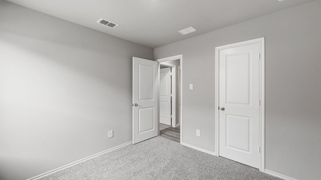 Representative unfurnished interior of a home built from the Dalton by D.R. Horton in Hickory Grove, Krum (Image 37).