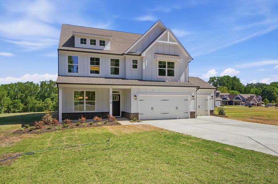 Front exterior of a new home in Chasewood, Mint Hill, NC, highlighting curb appeal (Image 26).