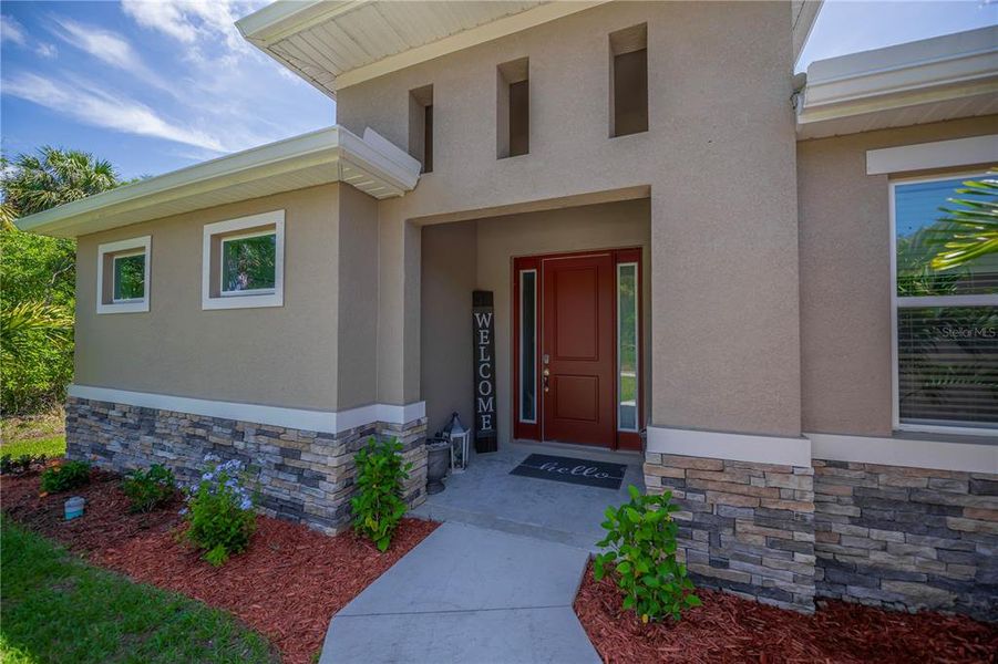 Exterior details and patio area of a home in , North Port (Image 25).