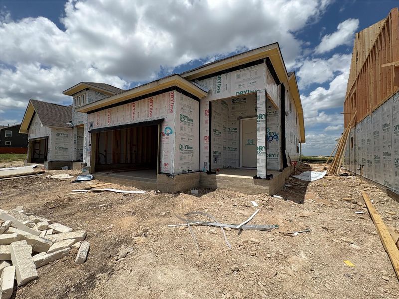 Front exterior of a new home in The Homestead at Lariat, Liberty Hill, TX, highlighting curb appeal (Image 11). Front exterior of a new home in The Homestead at Lariat, Liberty Hill, TX, highlighting curb appeal (Image 11).