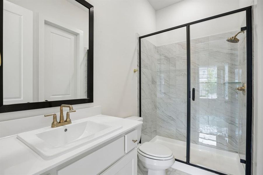 Friends and family will feel right at home in any of the beautifully finished guest baths.