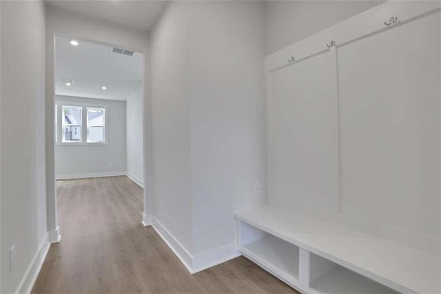 Spacious, unfurnished interior of a new home in The Paddocks at Doc Hughes, Buford (Image 30).