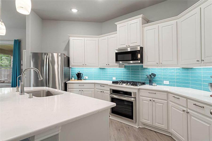 Great kitchen to make sure the cook never feels isolated.