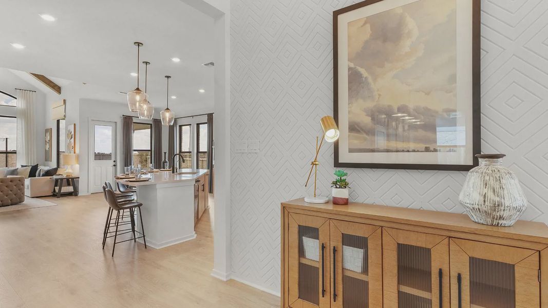Representative furnished interior of a home built from the Mariah by Chesmar Homes in University Heights, Round Rock (Image 10).