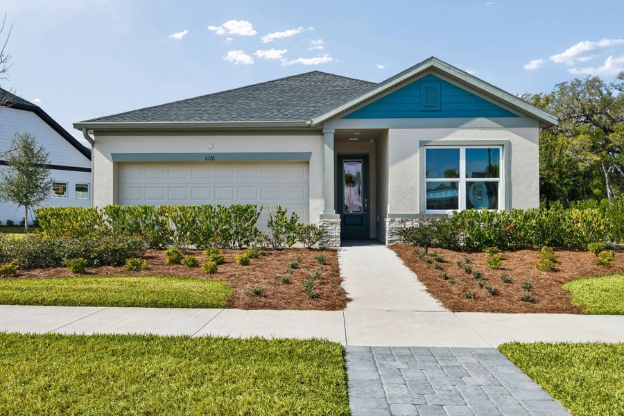 Representative exterior photo of a completed home built from the The Sanborn by David Weekley Homes in Oakfield at Mount Dora Cottage Series, Mount Dora, FL (Image 1). Representative exterior photo of a completed home built from the The Sanborn by David Weekley Homes in Oakfield at Mount Dora Cottage Series, Mount Dora, FL (Image 1).