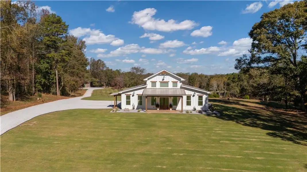 Front exterior of a new home in , Maysville, GA, highlighting curb appeal (Image 1). Front exterior of a new home in , Maysville, GA, highlighting curb appeal (Image 1).