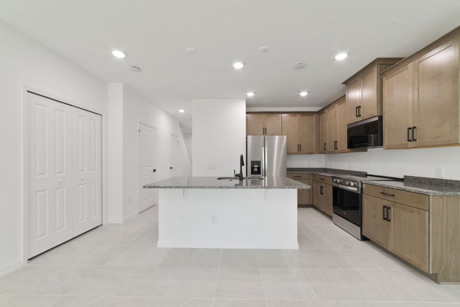 Furnished interior view inside a new home in Towns at Greenleaf, Oviedo (Image 17).