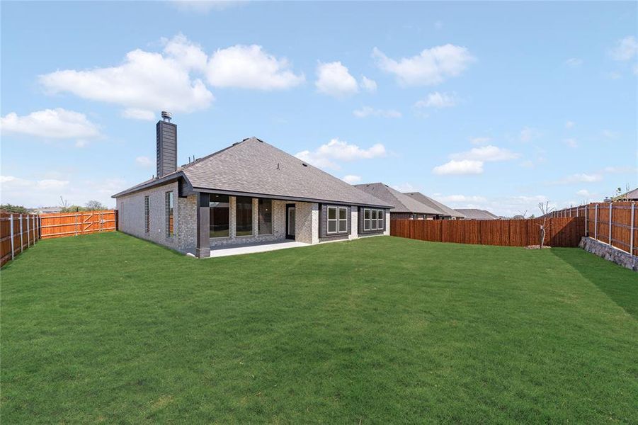 Exterior details and patio area of a home in North Grove, Waxahachie (Image 3).