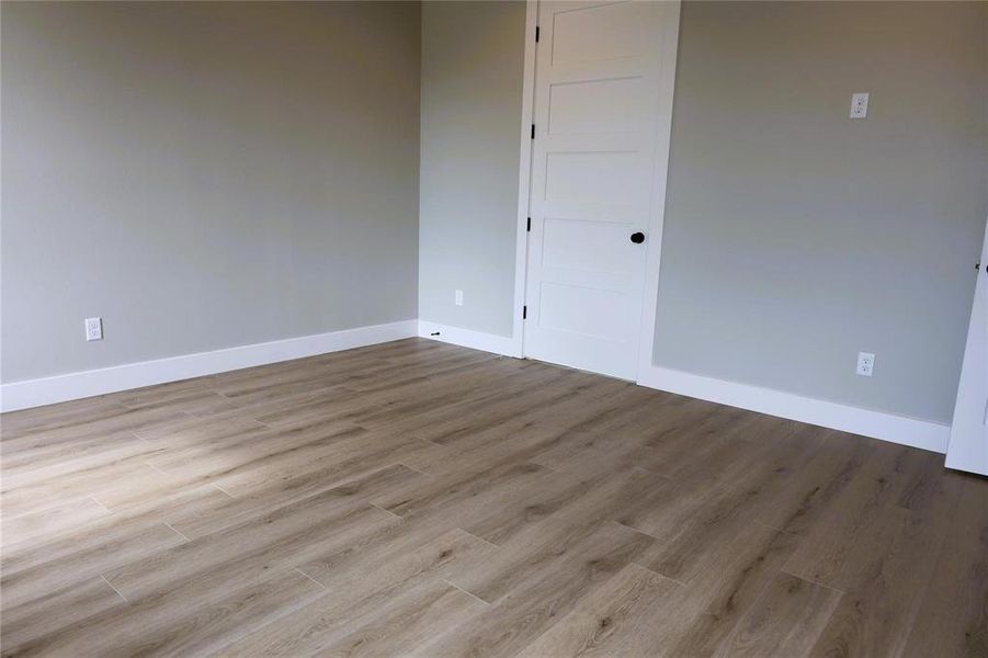 Unfurnished room featuring light hardwood / wood-style flooring