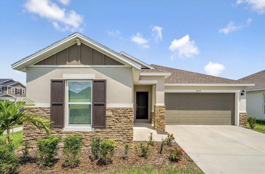 Front exterior of a new home in , Davenport, FL, highlighting curb appeal (Image 24). Front exterior of a new home in , Davenport, FL, highlighting curb appeal (Image 24).