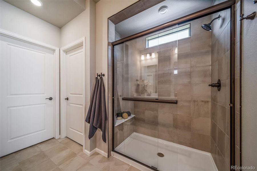 Furnished interior view inside a new home in The Reserve, Aurora (Image 26).