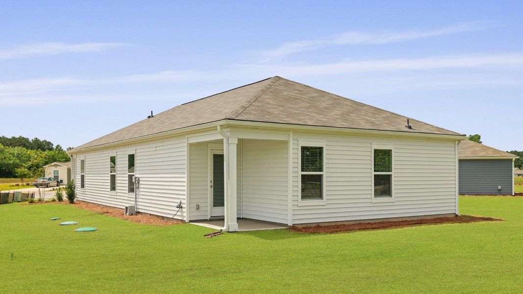 Exterior details and patio area of a home in Evergreen, Holly Hill (Image 4).