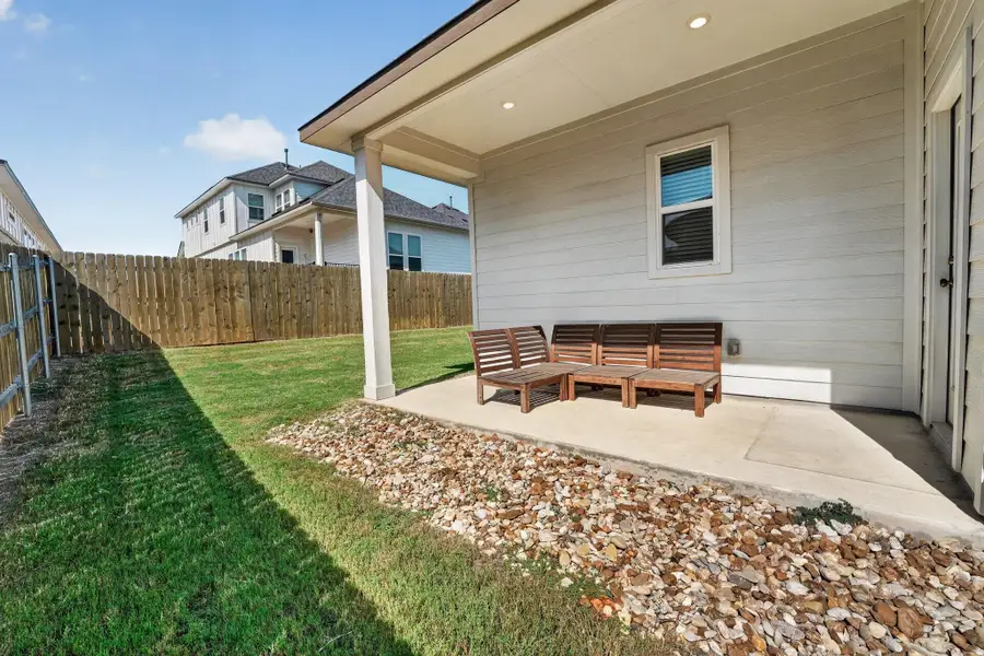 Exterior details and patio area of a home in Cascades at Onion Creek, Austin (Image 28).