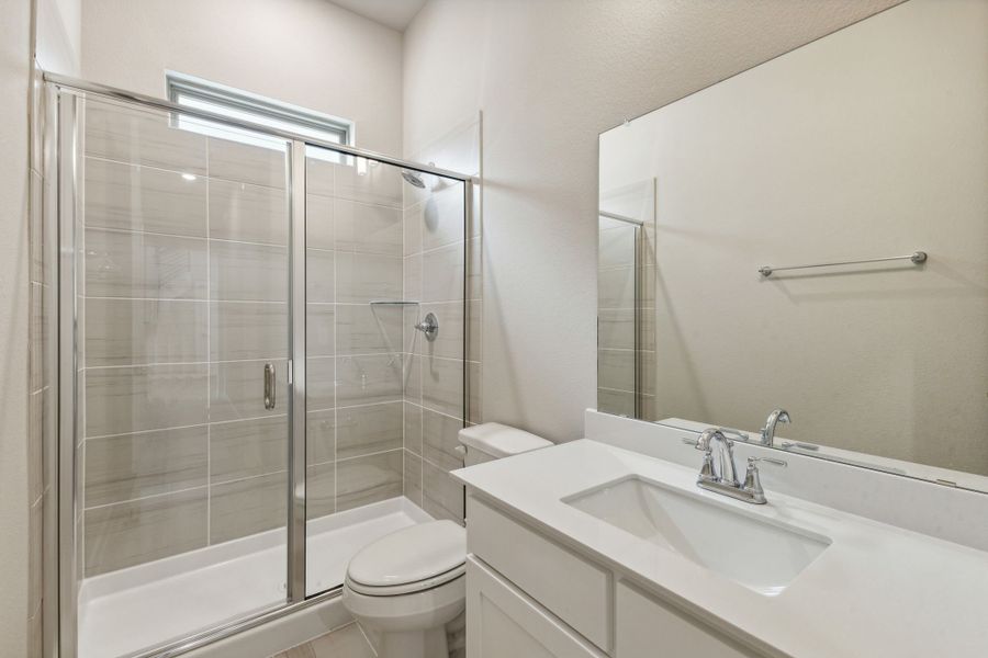 Bathroom in the Da Vinci II home plan by Trophy Signature Homes – REPRESENTATIVE PHOTO