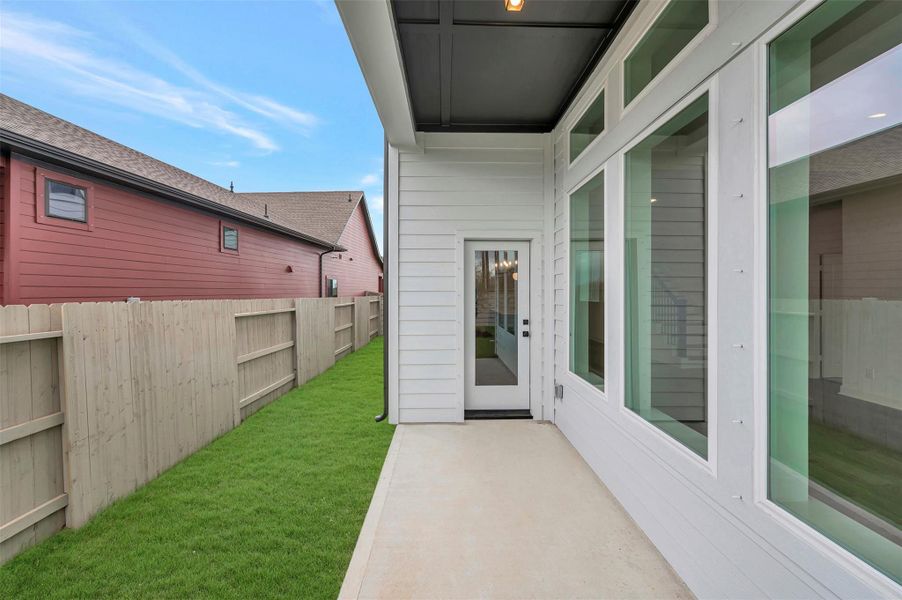 Exterior details and patio area of a home in Pomona - Reserve Collection, Manvel (Image 27).