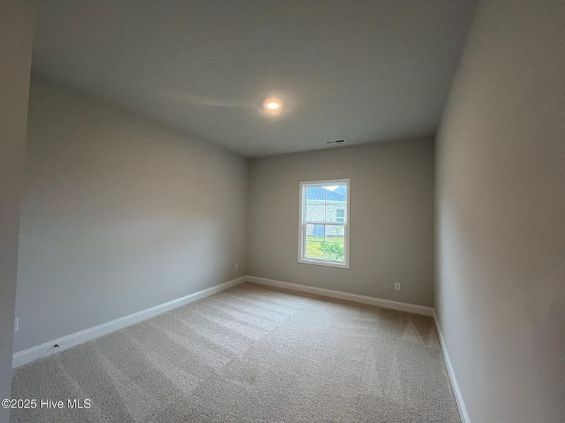 Spacious, unfurnished interior of a new home in Palmetto Creek, Bolivia (Image 22).