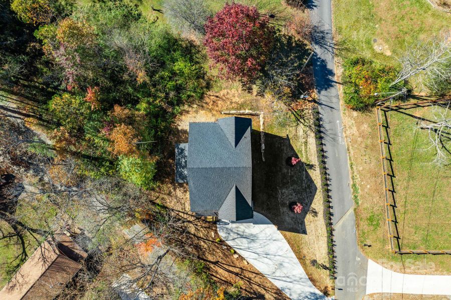 Front exterior of a new home in , Weaverville, NC, highlighting curb appeal (Image 24).