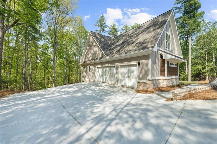 Front exterior of a new home in , Gainesville, GA, highlighting curb appeal (Image 23).
