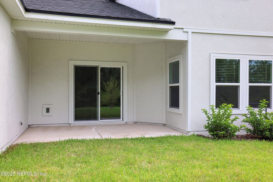 Front exterior of a new home in Cordova Palms, St. Augustine, FL, highlighting curb appeal (Image 19).