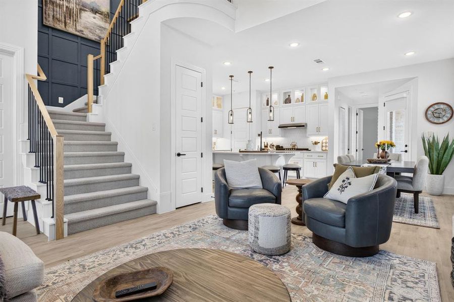 Staircase is nice and wide with a wood bannister and iron spindles. A few curves in the interior lend interest and intrigue! Staircase is nice and wide with a wood bannister and iron spindles. A few curves in the interior lend interest and intrigue!