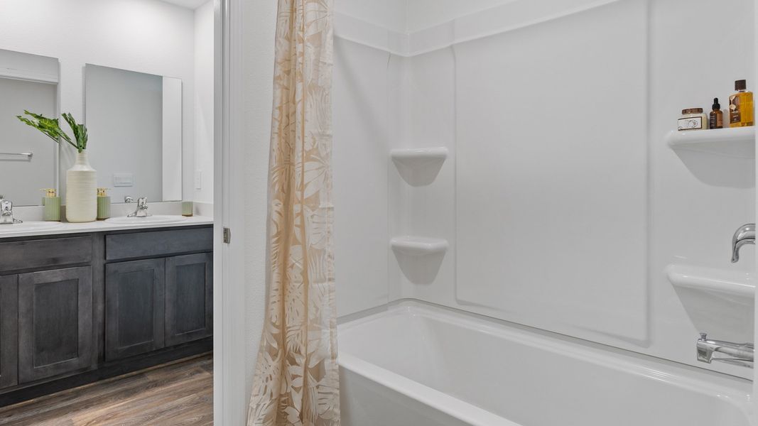 Representative furnished interior of a home built from the HAYDEN by D.R. Horton in Rookery, Green Cove Springs (Image 17).