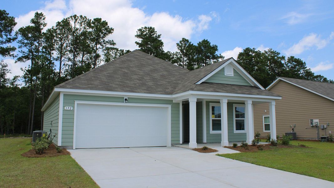 Front exterior of a home in the Rich Square at Brunswick Plantation community, located in Ash, NC (Image 21). Front exterior of a home in the Rich Square at Brunswick Plantation community, located in Ash, NC (Image 21).