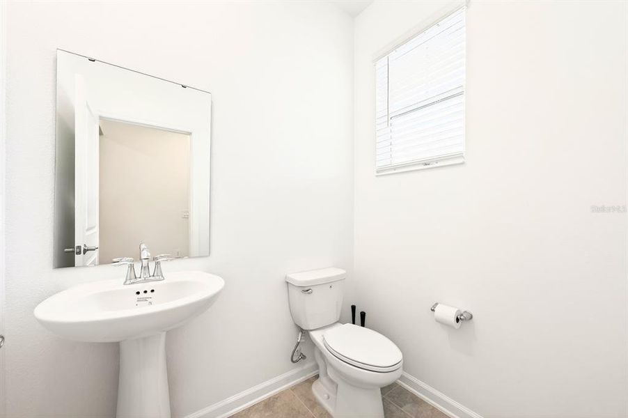 Furnished interior view inside a new home in Tohoqua, Kissimmee (Image 13).