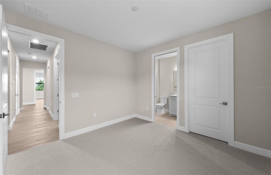 Spacious, unfurnished interior of a new home in Arbor Oaks, North Port (Image 14).