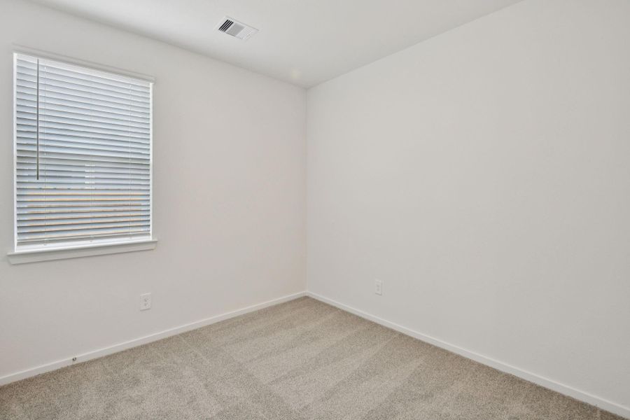 Spacious, unfurnished interior of a new home in Sanford Farms - Traditional Series, Waller (Image 35).