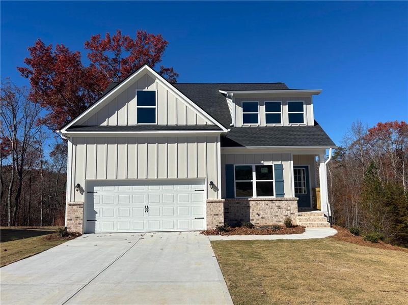 Front exterior of a new home in , Gainesville, GA, highlighting curb appeal (Image 2). Front exterior of a new home in , Gainesville, GA, highlighting curb appeal (Image 2).