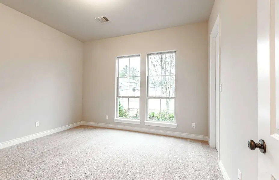 Representative unfurnished interior of a home built from the 3616 by Ravenna Homes in Artavia 70′, Conroe (Image 48).