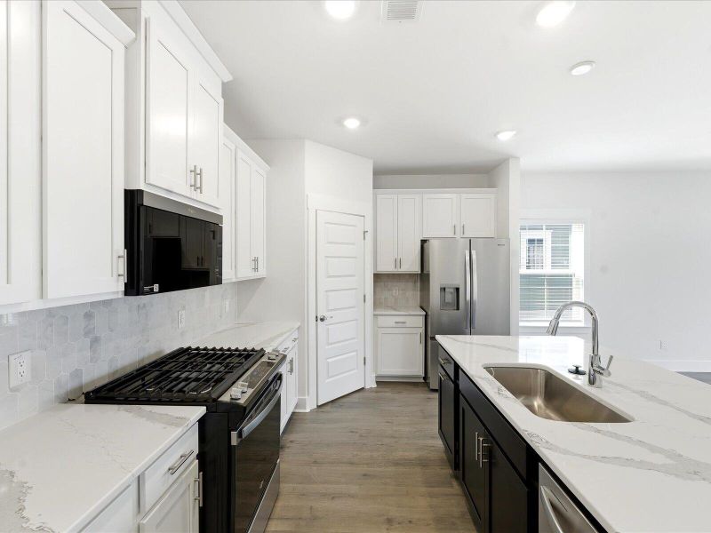 Furnished interior view inside a new home in The Coves at Lakes of Cane Bay II, Summerville (Image 17).