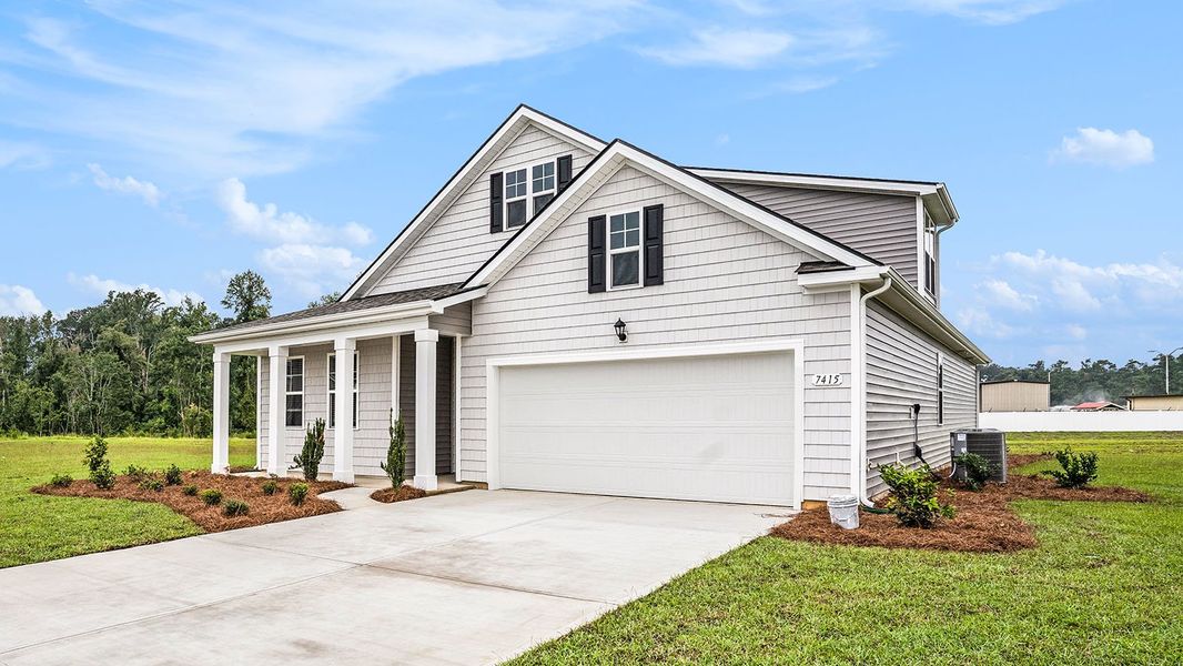 Front exterior of a new home in Magnolia Farms, Florence, SC, highlighting curb appeal (Image 19).