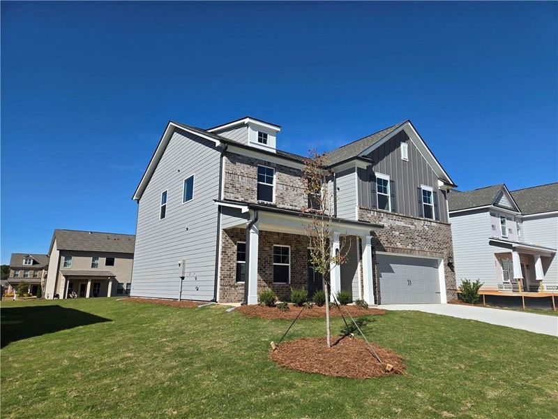 Exterior details and patio area of a home in Enclave at Logan Point, Loganville (Image 25).
