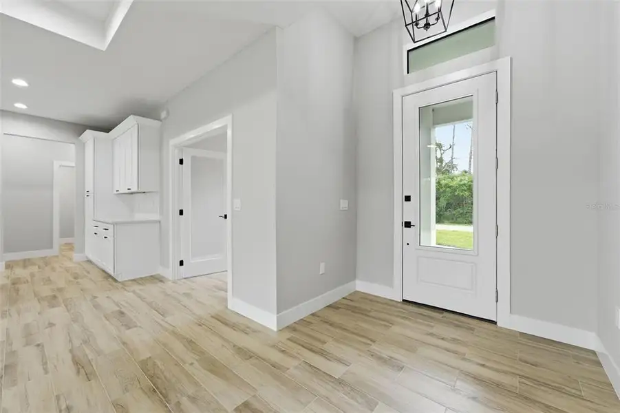 Spacious, unfurnished interior of a new home in , Port Charlotte (Image 22).