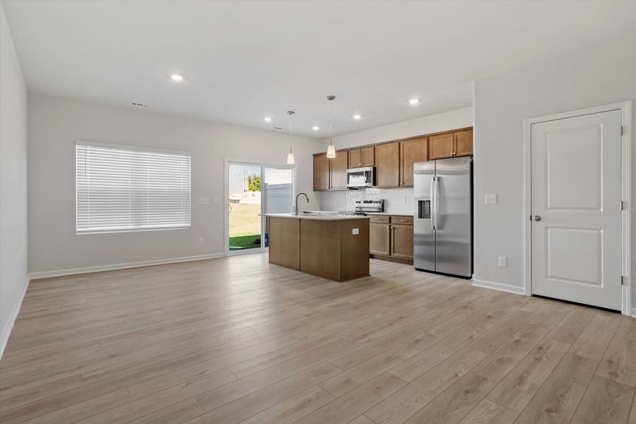 Furnished interior view inside a new home in West Main Townhomes, Sanford (Image 4).