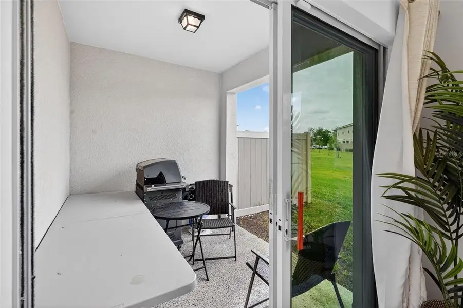 Exterior details and patio area of a home in , Kissimmee (Image 4).