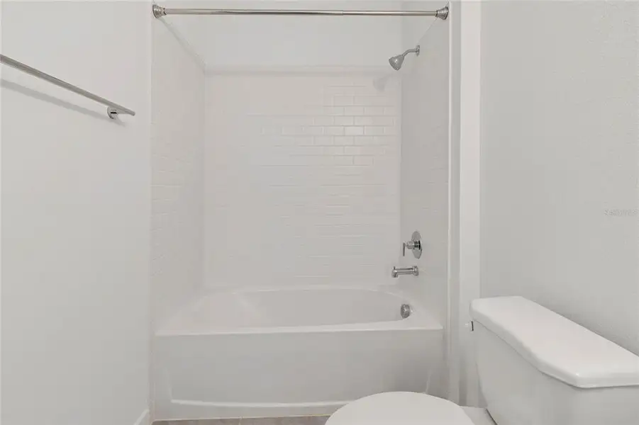 Furnished interior view inside a new home in Aspire at Canter Creek, Davenport (Image 5).