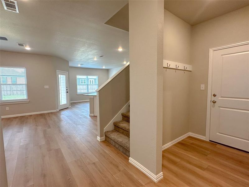 Foyer featuring light wood-type flooring