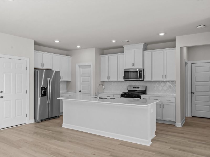 Furnished interior view inside a new home in The Farm at Wells Creek - Heritage Collection, Gray Court (Image 3).