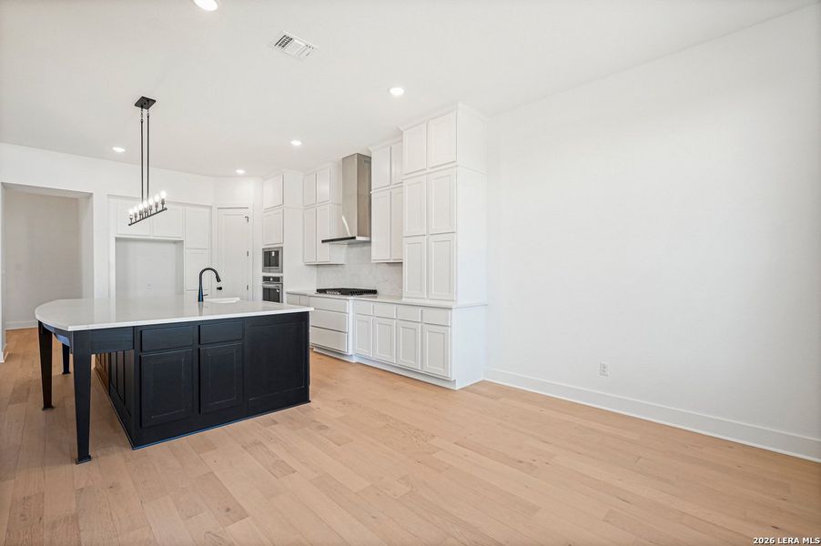 Furnished interior view inside a new home in La Cima, San Marcos (Image 11).