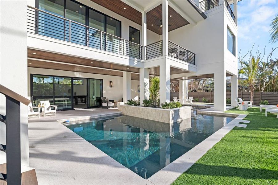 Exterior details and patio area of a home in , Sarasota (Image 24).